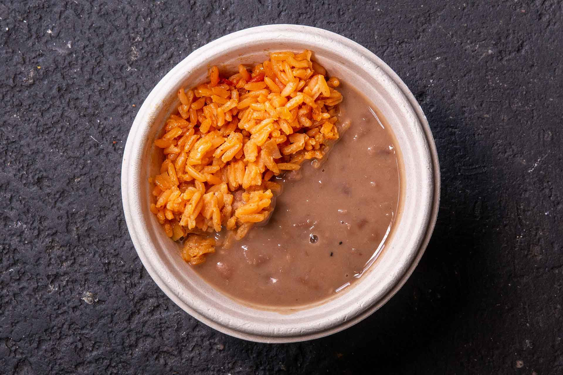 Rice and Beans - Hefty scoops of classic refried beans and Mexican yellow rice.
